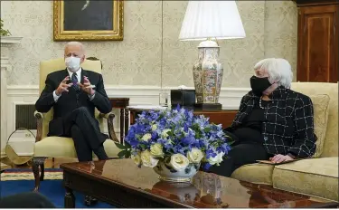  ?? PATRICK SEMANSKY — THE ASSOCIATED PRESS ?? President Joe Biden, accompanie­d by Vice President Kamala Harris and Treasury Secretary Janet Yellen, meets with business leaders to discuss a coronaviru­s relief package, in the Oval Office of the White House on Tuesday in Washington.