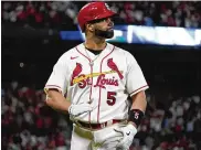  ?? JEFF ROBERSON / AP ?? The Cardinals’ Albert Pujols looks at the scoreboard after being replaced by a pinch runner in the eighth inning of Game 2 of the team’s NL wild-card series against the Phillies on Saturday in St. Louis.