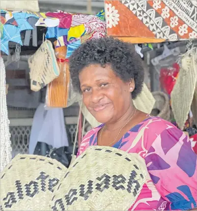  ?? Picture: JAKE WISE ?? Milika Baikerewa in her handicraft centre in Nausori.