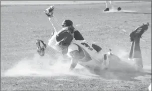  ?? The Sentinel-Record/Grace Brown ?? SAFE AT THIRD: Jessievill­e’s Adam Saveall (9) slides safely into third base as Fountain Lake’s Montana Carden (16) dives for the ball during a baseball game Wednesday at Jessievill­e’s baseball field. Both teams are scheduled to face conference...