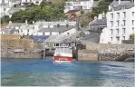  ??  ?? TOP A tight squeeze: the entrance to Polperro Harbour RIGHT High summer and high tide in Looe