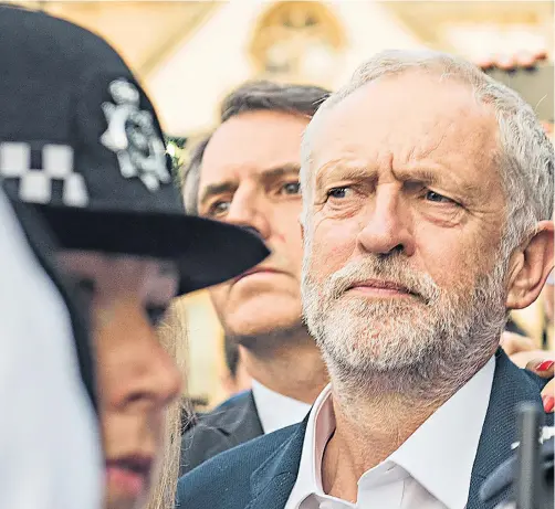  ??  ?? Labour leader Jeremy Corbyn with a crowd of his Momentum supporters in Parliament Square last night