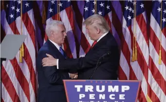  ?? ap File ?? POPULAR IDEA: The election of President Trump (right with Vice President Mike Pence) with less than 50% of the popular vote has spurred calls to abolish the Electoral College.