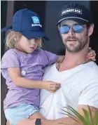  ??  ?? Chris Hemsworth and daughter India.