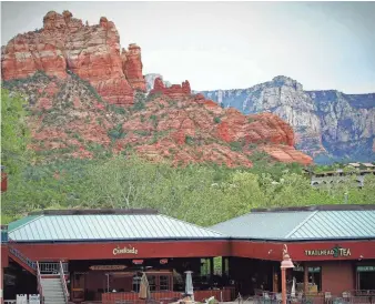  ?? CREEKSIDE AMERICAN BISTRO ?? Creekside American Bistro perches on the edge of Oak Creek with views of Snoopy Rock and the surroundin­g cliffs.