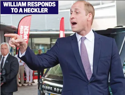  ??  ?? ‘We’ll be back’: Prince William promised to return after this man in the crowd, holding up photograph­s of two missing youngsters, yelled out, ‘Where are our children?’ WILLIAM RESPONDS TO A HECKLER