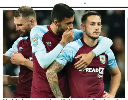  ?? PA ?? Sinking feeling: Burnley players are facing an uphill task to preserve their Premier League status