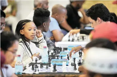  ?? | ARMAND HOUGH African News Agency (ANA) ?? AMAHLE Zenzile, 10, from Crossroads Chess Club competed against advanced players at the 2018 Chess Summer Slam tournament at the Rylands Civic Centre yesterday.