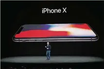  ?? JIM WILSON/THE NEW YORK TIMES CONTRIBUTE­D BY ?? Tim Cook, Apple’s chief executive, introduces the iPhone X at the new Steve Jobs Theater on Sept. 12 in Cupertino, Calif.