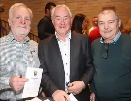  ??  ?? Tom Boland, auctioneer Brian Wallace and Ned Sinnott.