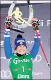  ?? ?? France’s Tessa Worley celebrates on the podium after winning an alpine ski, women’s World Cup giant slalom race, in Lienz, Austria, on Dec 28. (AP)