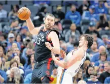  ?? ALONZO ADAMS-USA TODAY SPORTS ?? Toronto Raptors center Marc Gasol (33) grabs a pass against Oklahoma City Thunder forward Mike Muscala (33) during the second half at Chesapeake Energy Arena. Toronto won 130121.