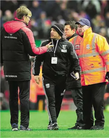  ?? Reuters ?? Seeing red Liverpool manager Juergen Klopp clashes with West Brom assistant head coach Mark O’Connor after the game. Klopp refused to shake hands with Tony Pulis after the game.