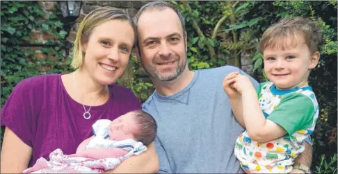  ?? Picture: Gary Browne FM4889711 ?? David and Brianne Hamilton with their son Patrick and baby daughter Madeline, who was born in the car park outside William Harvey Hospital