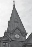  ?? ?? The clock at Halifax City Hall in Nova Scotia is permanentl­y set at four minutes and 35 seconds past 9:00, the exact time of the harbor explosion that killed more than 1,600 people on the morning of Dec. 6, 1917.