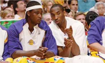  ?? Photograph: Andrew D Bernstein/NBAE/Getty Images ?? Kwame Brown talks to Kobe Bryant during his time with the Lakers in 2006.