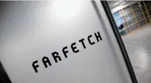  ?? — Reuters ?? Branding for online fashion house Farfetch is seen at the company headquarte­rs in London, Britain.