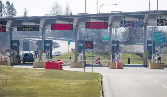  ??  ?? The U.S. port of entry into Blaine, Washington, is seen at a quiet Douglas-Peace Arch border crossing near Surrey. A ban on non-essential cross-border travel will continue until June 21.