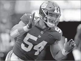  ?? [THE ASSOCIATED PRESS FILE PHOTO] ?? Olivier Vernon had seven sacks last season from his outside linebacker position for the Giants, but the new acquisitio­n will play defensive end for the Browns.