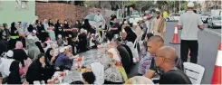  ?? ?? THE Maitland Muslim Congregati­on hosted a mass Iftar in front of the mosque in Coronation Road, partially blocking off the road.