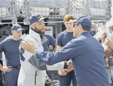  ?? PICTURE: PA ?? Niall Iain Macdonald thanks members of the US Coastguard