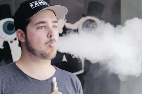  ?? ALLEN MCINNIS/ THE GAZETTE ?? Julien-Pierre Maltais, manager of the Vaporus shop on St-Denis St., switched to vaping three years ago and says he has seen the benefits, especially in his wallet.