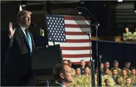  ??  ?? 特朗普在弗州梅爾亨德­森軍事基地大禮堂發表­上任後首場全國電視直­播演說。（法新社照片）