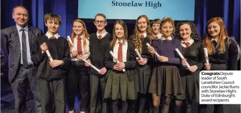  ??  ?? Congrats Depute leader of South Lanarkshir­e Council councillor Jackie Burns with Stonelaw High’s Duke of Edinburgh’s award recipients