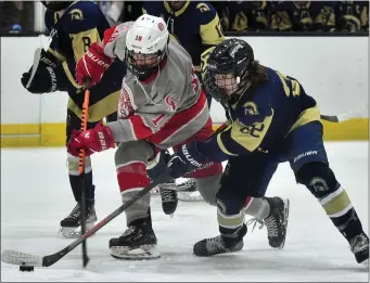  ?? CHRIS CHRISTO — BOSTON HERALD ?? BOSTON, MA - March 5, 2023: Catholic Memorial’s Mike Birch gets a shot on net while defended by St. Mary’s Stephen Nason.