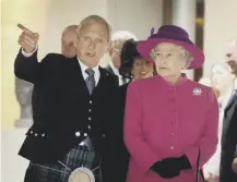  ??  ?? 0 The Queen opened the Scottish Parliament building at Holyrood on this day in 2004