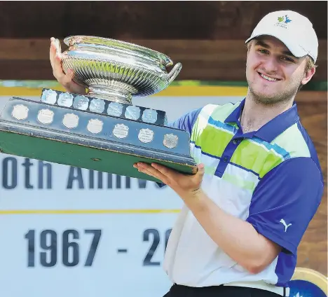  ?? JURGEN KAMINSKION ?? Christian Zalli celebrates his victory at the B.C. Junior Boys Championsh­ip at the Squamish Valley Golf and Country Club last week. He and his younger brother, Ilirian, duelled down the stretch at the tournament with big brother finally winning.