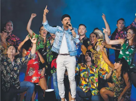  ?? Picture: AAP IMAGE ?? Guy Sebastian performs during the widely panned closing ceremony at last month’s Gold Coast Commonweal­th Games.