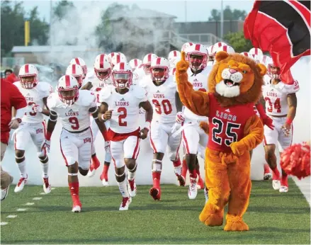  ?? (Submitted photo) ?? The East Mississipp­i Community College Lions run onto the field for a game.