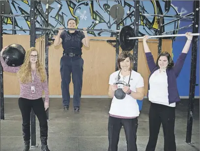  ?? JoNaTHaN RiLey/TC Media ?? Parole officer Katie Hastey, correction­s officer Amanda Dowe, registered nurse Amber MacDonald and licensed practical nurse Dianna Prest took part in the Internatio­nal Women’s Day Workout at Crossfit Bluenose in Bible Hill on Wednesday.