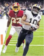  ?? BILL FEIG/ASSOCIATED PRESS ?? More than twice as many TV viewers watched the Saints-Redskins game Monday than watched the Yankees-Red Sox in the ALCS.