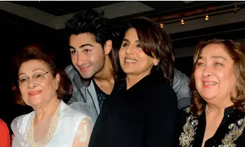  ??  ?? The late Krishna Kapoor (left) with grandson Armaan, daughter in-law Neetu Singh and daughter Reema