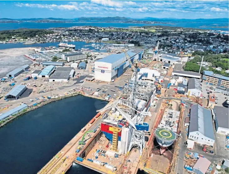  ?? ?? WORLEY CLASS: Above, the company’s Rosenberg yard in Stavanger, Norway, right, a Worley employee using the rope access equipment, and far right, the module for Buzzard Phase II at Worley’s Rosenberg yard.