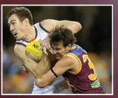  ?? PHOTOS: CHRIS HYDE/GETTY ?? STANDING TALL: Brisbane Lions defender Sam Mayes is enjoying the best season of his career. ABOVE: Mayes tackles Jeremy Cameron of the Giants.