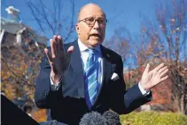  ?? EVAN VUCCI/ASSOCIATED PRESS ?? White House chief economic adviser Larry Kudlow talks about trade negotiatio­ns with China while speaking with reporters at the White House on Monday in Washington.