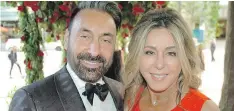  ??  ?? Vern and Nicole Milani made the red carpet parade entering Monet’s Secret Garden of Giverny for the VAG’s signature summer soirée.