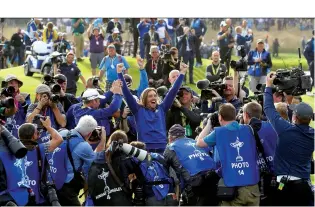  ??  ?? Tommy Fleetwood celebrates Europe’s 2018 triumph at Le Golf National