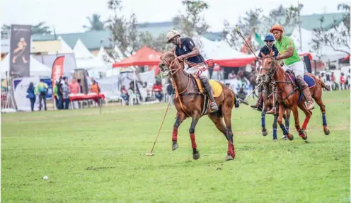  ??  ?? Seidu Umar of Ibadan polo club dribbles past his opponent at a recent Niger Delta polo festival in Port Harcourt.