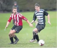  ??  ?? Annfield (black and white) lost 8-4 to Dundee Argyle in the Dundee Sunday FA at Ardler.