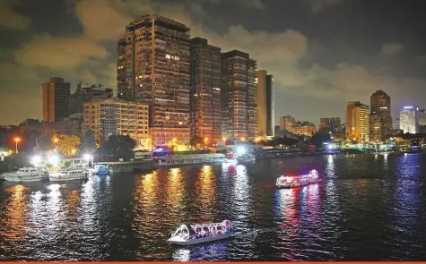  ?? Reuters ?? People travel on pleasure boats on the river Nile during the Eid Al Adha holiday in Cairo yesterday.