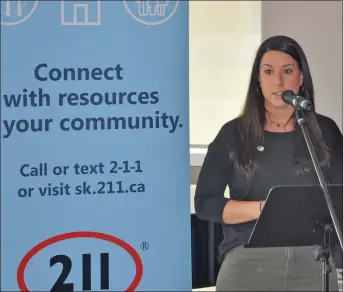  ?? Photo by Matthew Liebenberg ?? Swift Current United Way Executive Director Stacey Schwartz speaks at the launch of the 211 service expansion in Swift Current, June 2018.