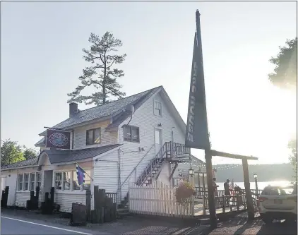  ??  ?? WATERING HOLE: Lake House Pub and Grill has a terrace which overlooks the stunning Lake Bomoseen