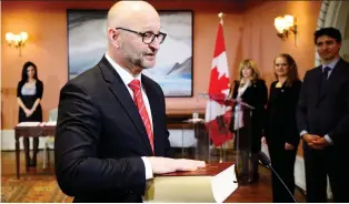  ?? SEAN KILPATRICK/THE CANADIAN PRESS ?? David Lametti is sworn in as justice minister and attorney general of Canada during a ceremony at Rideau Hall in Ottawa on Monday. He replaces Jody-Wilson Raybould in the position.
