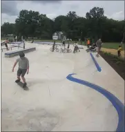  ?? DAN SOKIL — MEDIANEWS GROUP ?? A skateboard­er prepares to roll through the bowl of the Lansdale skate park in July.