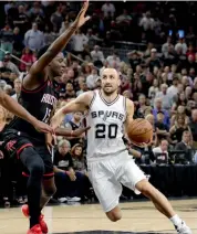  ?? — AP ?? San Antonio Spurs’ Manu Ginobili drives to the basket past Houston Rockets’ Clint Capela on Tuesday.