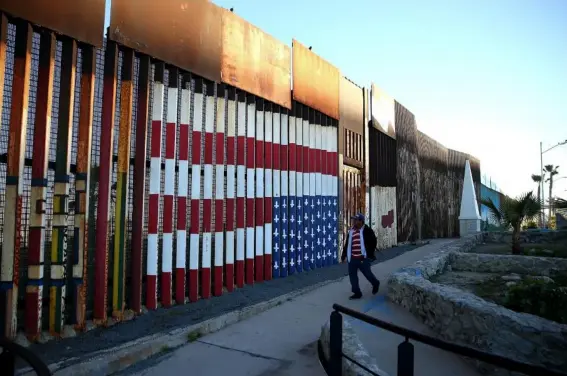  ??  ?? The president is demanding that congress include funds for the constructi­on of the wall, which he made a key theme of his campaign (Justin Sullivan/Getty Images)